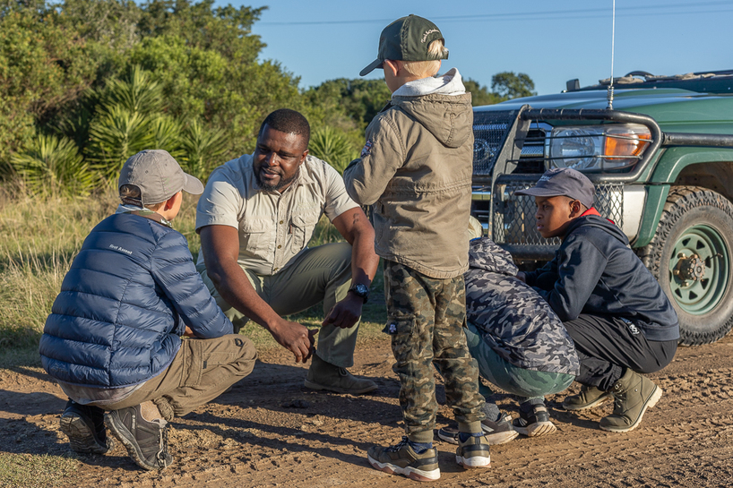 Children at Kariega learning about nature from their field guide - Img taken by Brendon Jennings