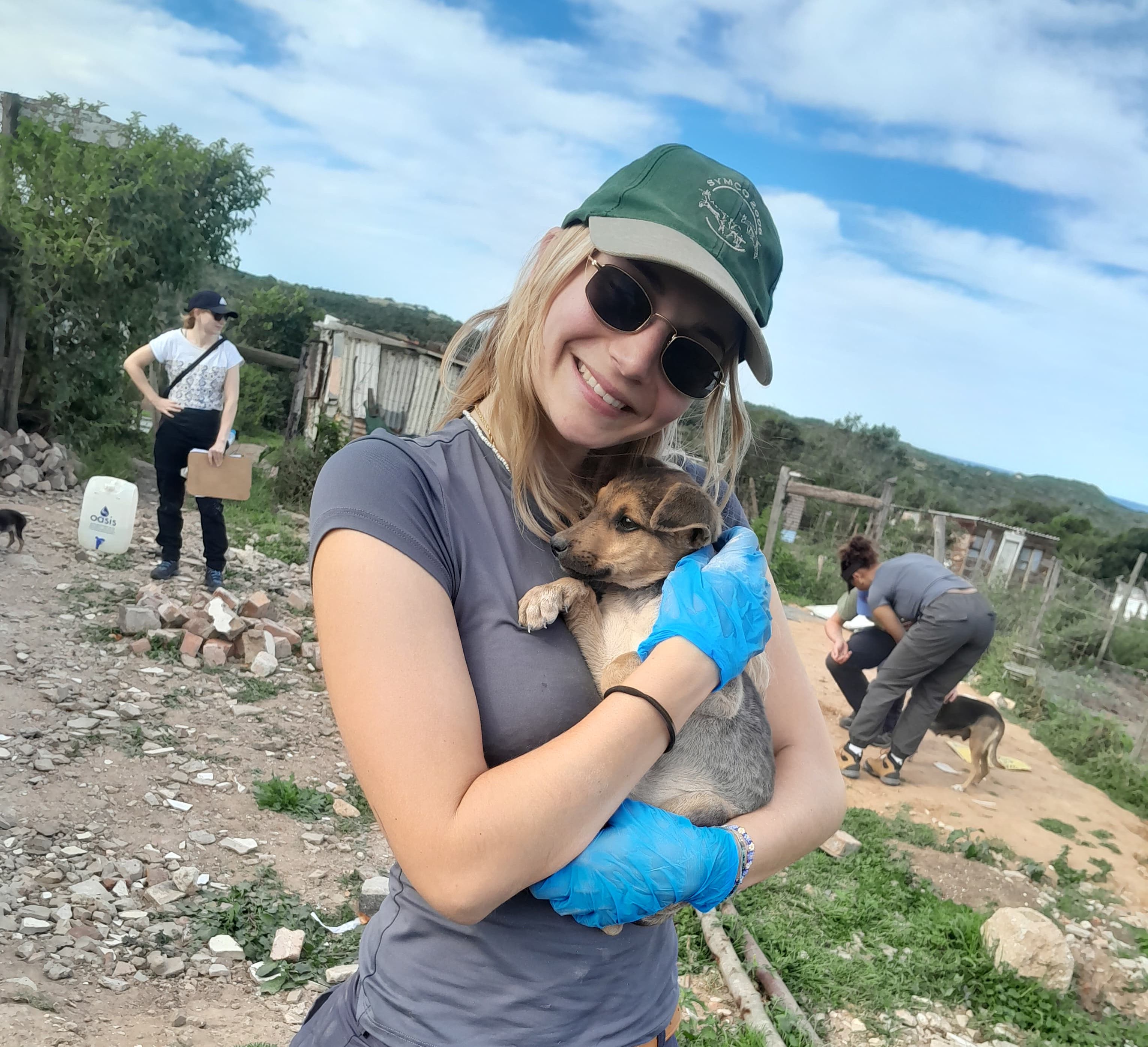 Volunteer doing domestic animal care work 